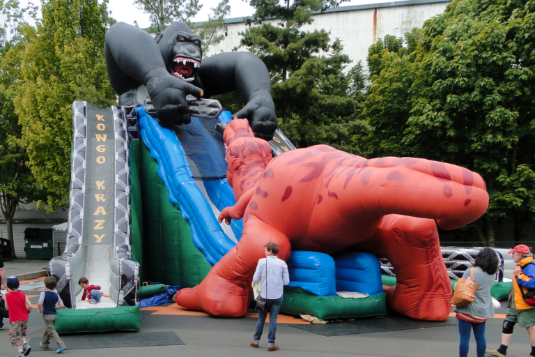 Triple A Rental >> Giant Gorilla Fights Dinosaur 30-ft Triple Lane Inflatable Slide Rental — National Event Pros Triple A Rental >> Giant Gorilla Fights Dinosaur 30-ft Triple Lane Inflatable Slide Rental — National Event Pros