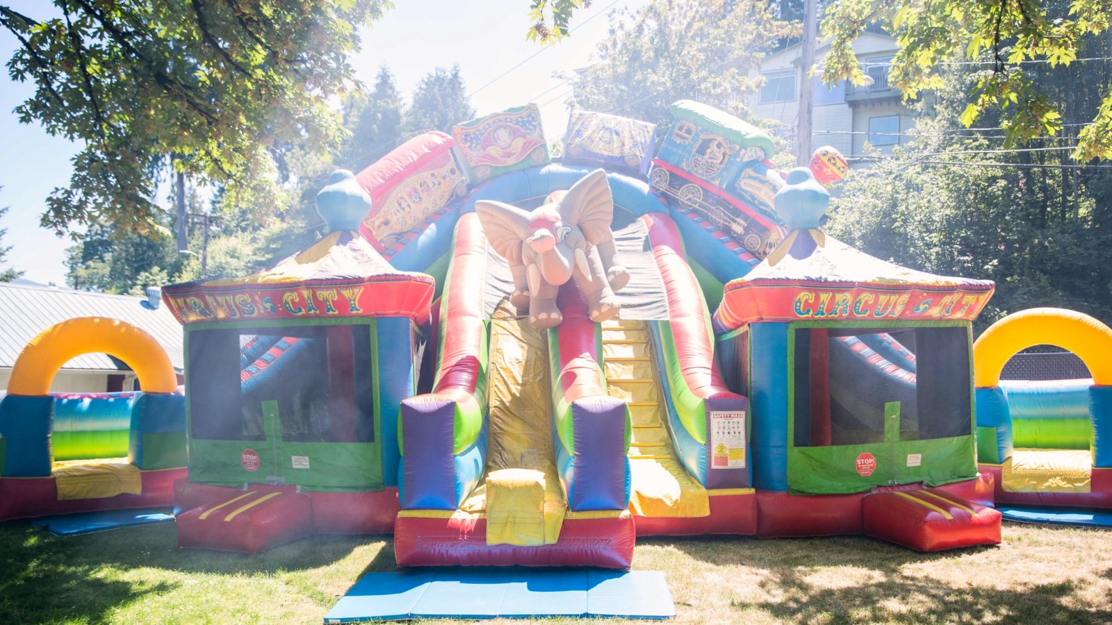 23′ Circus City Triple Lane Slide w/ Bouncers