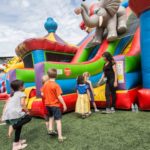 23′ Circus City Triple Lane Slide w/ Bouncers