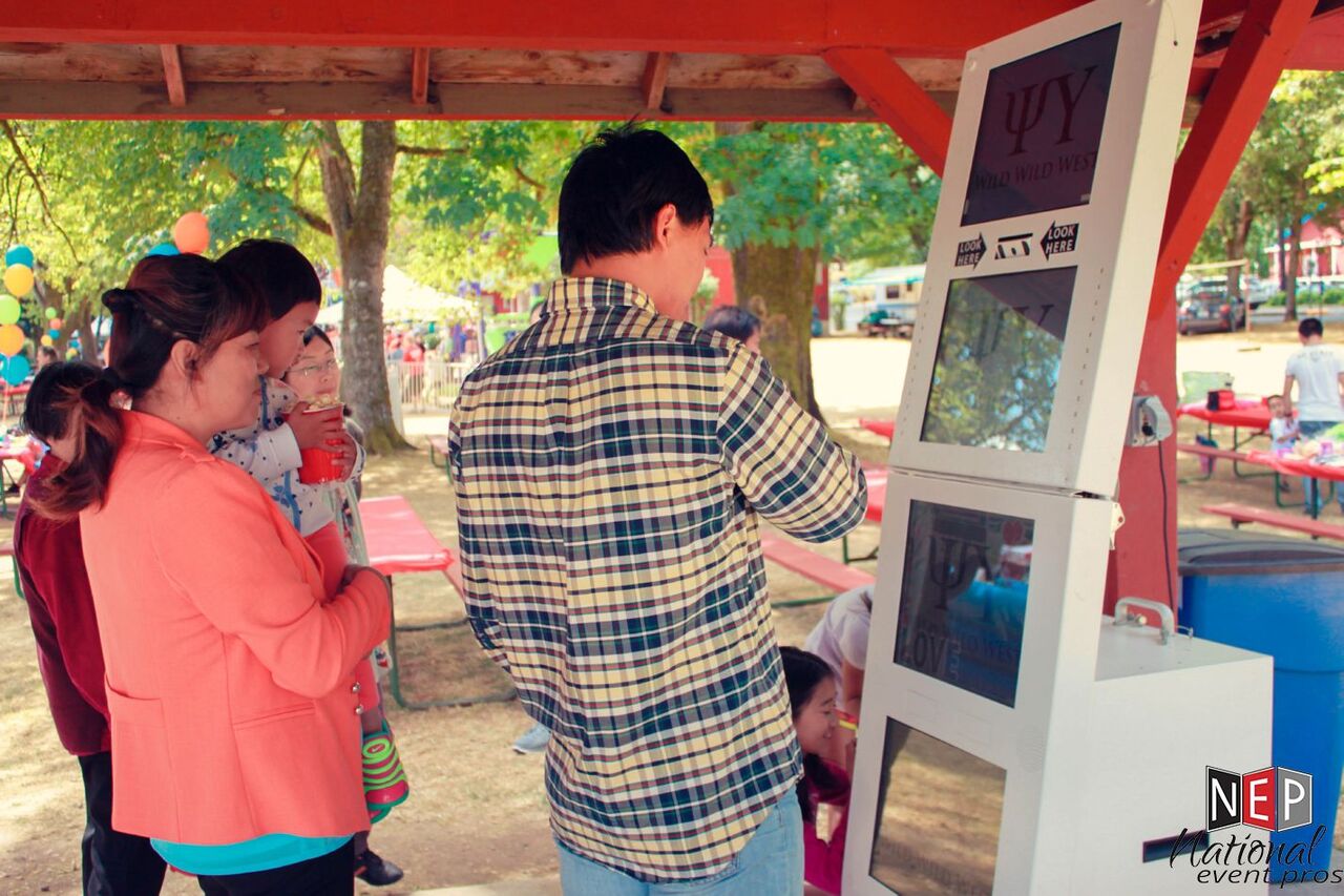 digital photo strip standalone photo booth at a company picnic