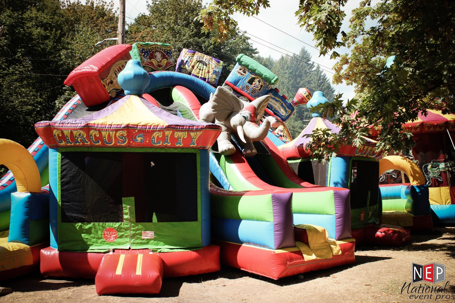23′ Circus City Triple Lane Slide w/ Bouncers