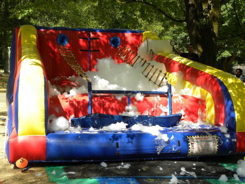 Jacob's Ladder inflatable rope ladder climbing challenge over a soap bubble foam pit