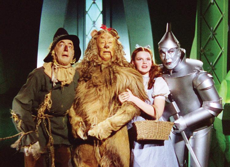 Scarecrow, Cowardly Lion, Dorothy, and Tin Man in The Wizard of Oz