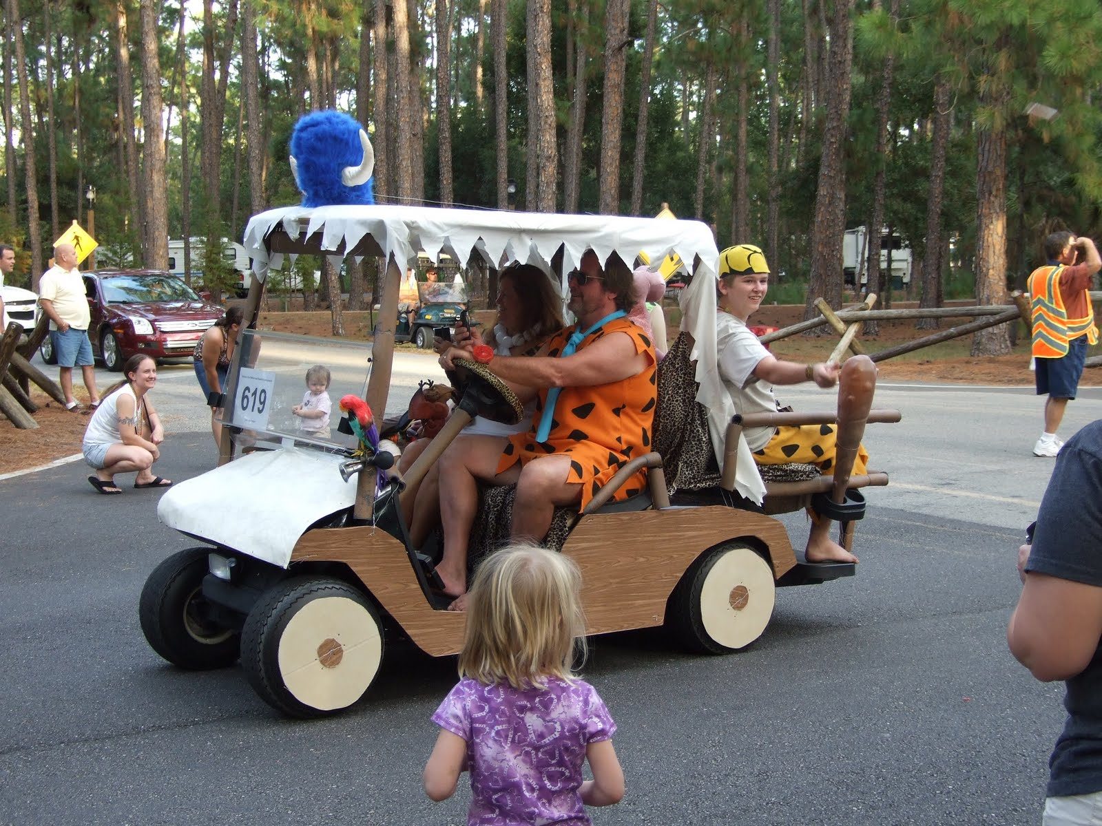golf cart decorated as The Flintstones car