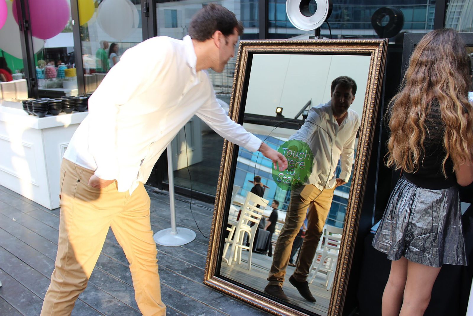 interactive mirror screen photo booth at a party