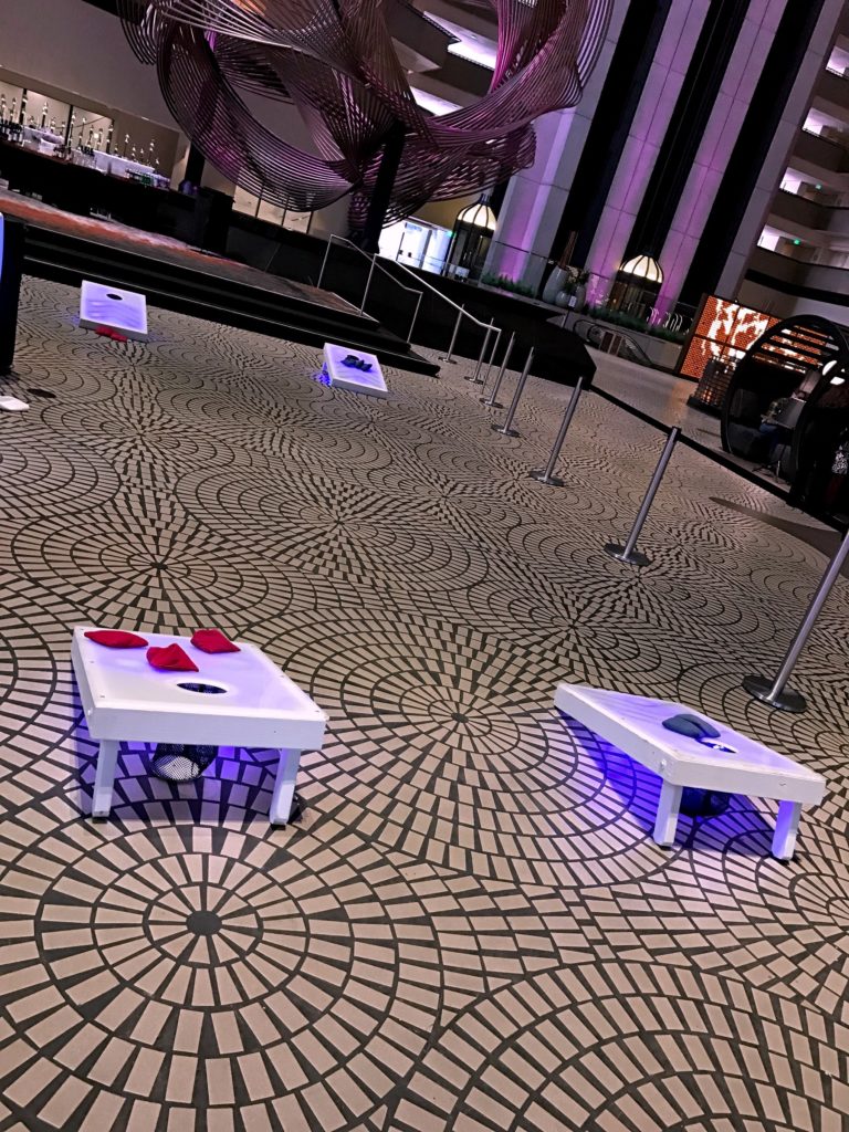 Glowing LED Cornhole Bean Bag Toss Game Rental · National Event Pros