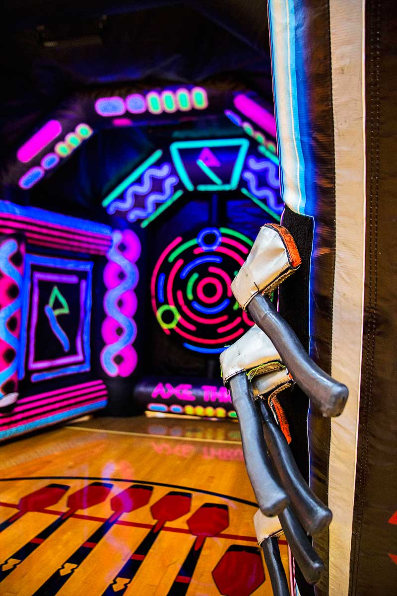 Glow in the dark Axe Throwing game National Event Pros